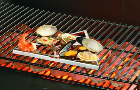 The Classic Triangular Great Grate loaded with shrimp, clams and mussels, grilling over hot coals